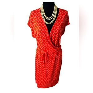 Wrap Dress, bright Orange, circular polka dots motif design. Size L, fits 10-14
